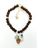 Polly's Acorn charm chain in forest / sky