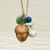 Polly's Acorn charm chain in forest / sky